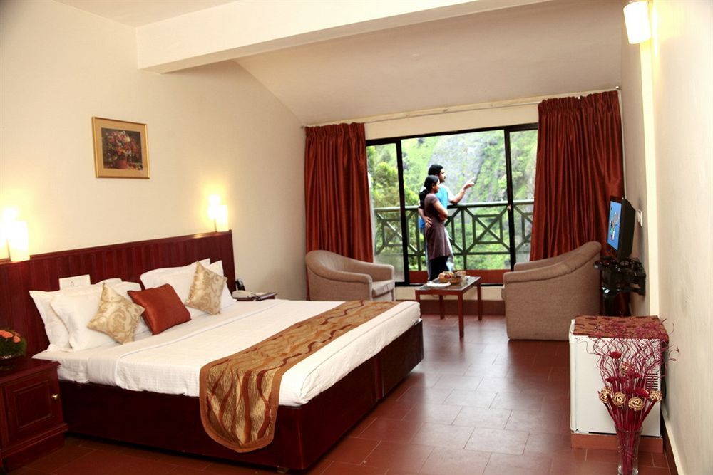 Abad Copper Castle Resort Муннар Екстер'єр фото